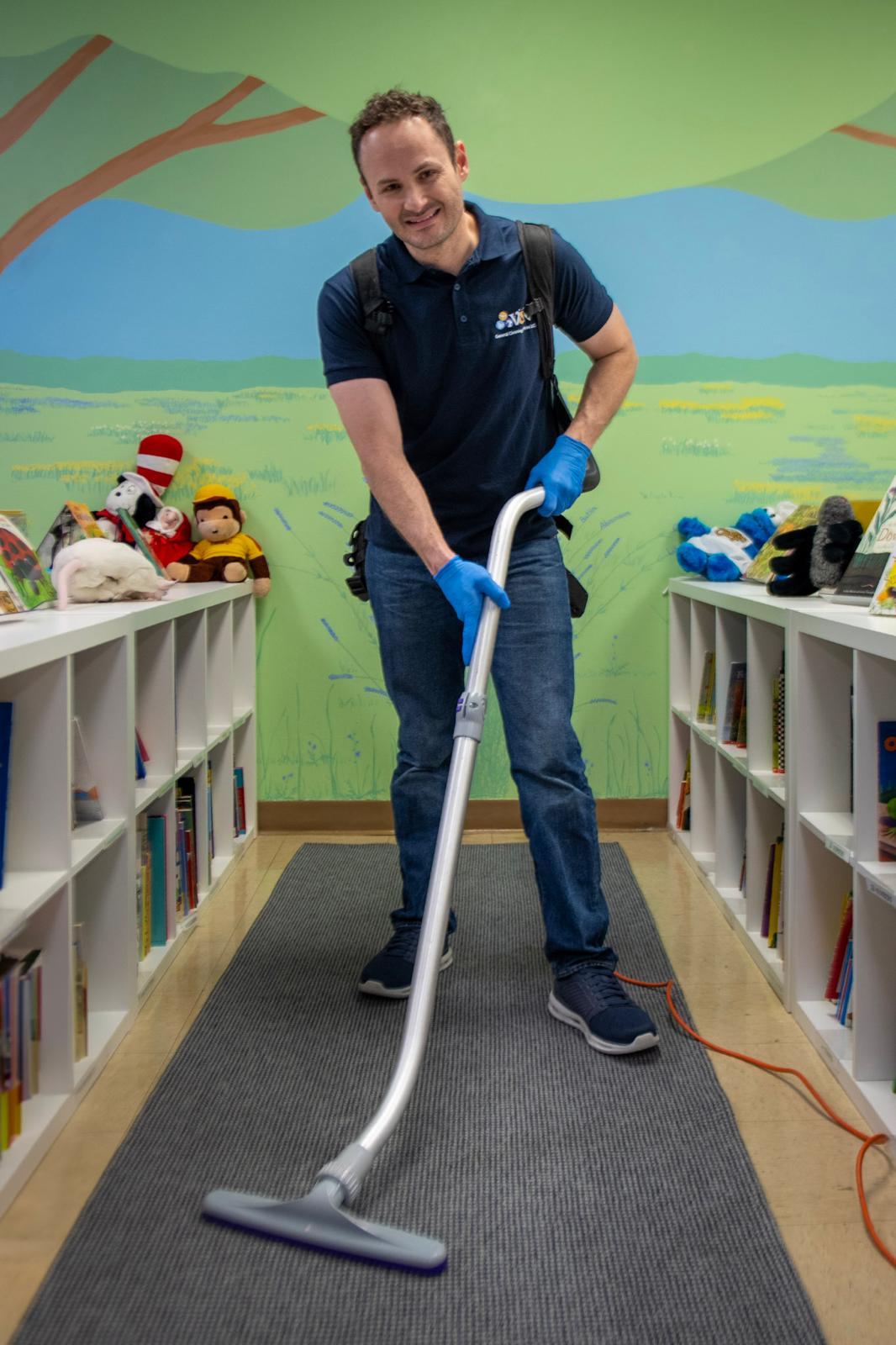 V&N janitorial crew vacuuming commercial space